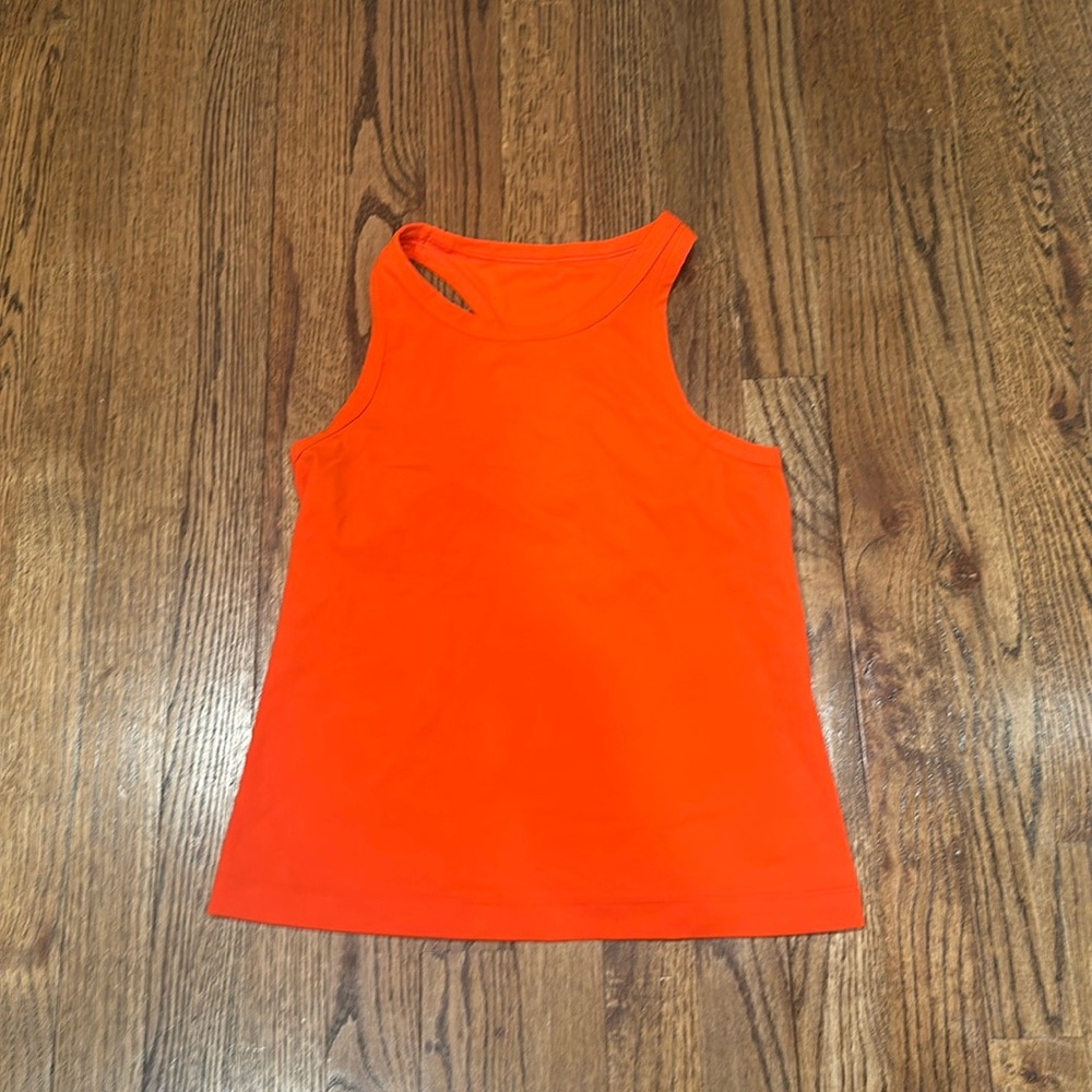 Orange lululemon tank. Cant find size but probably an eight